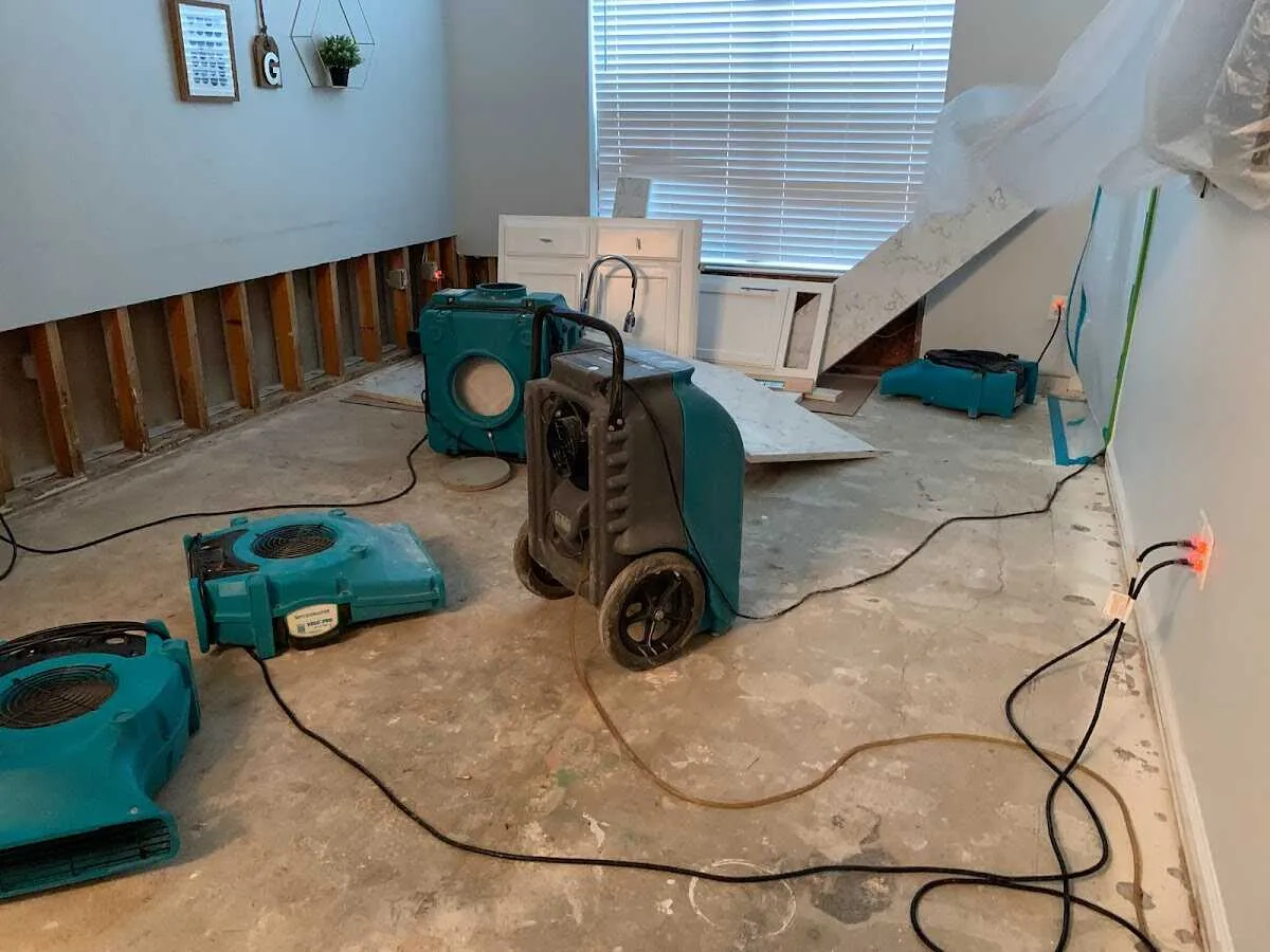 Dehumidifier in flood-cut room for Water Damage Restoration in Hurley